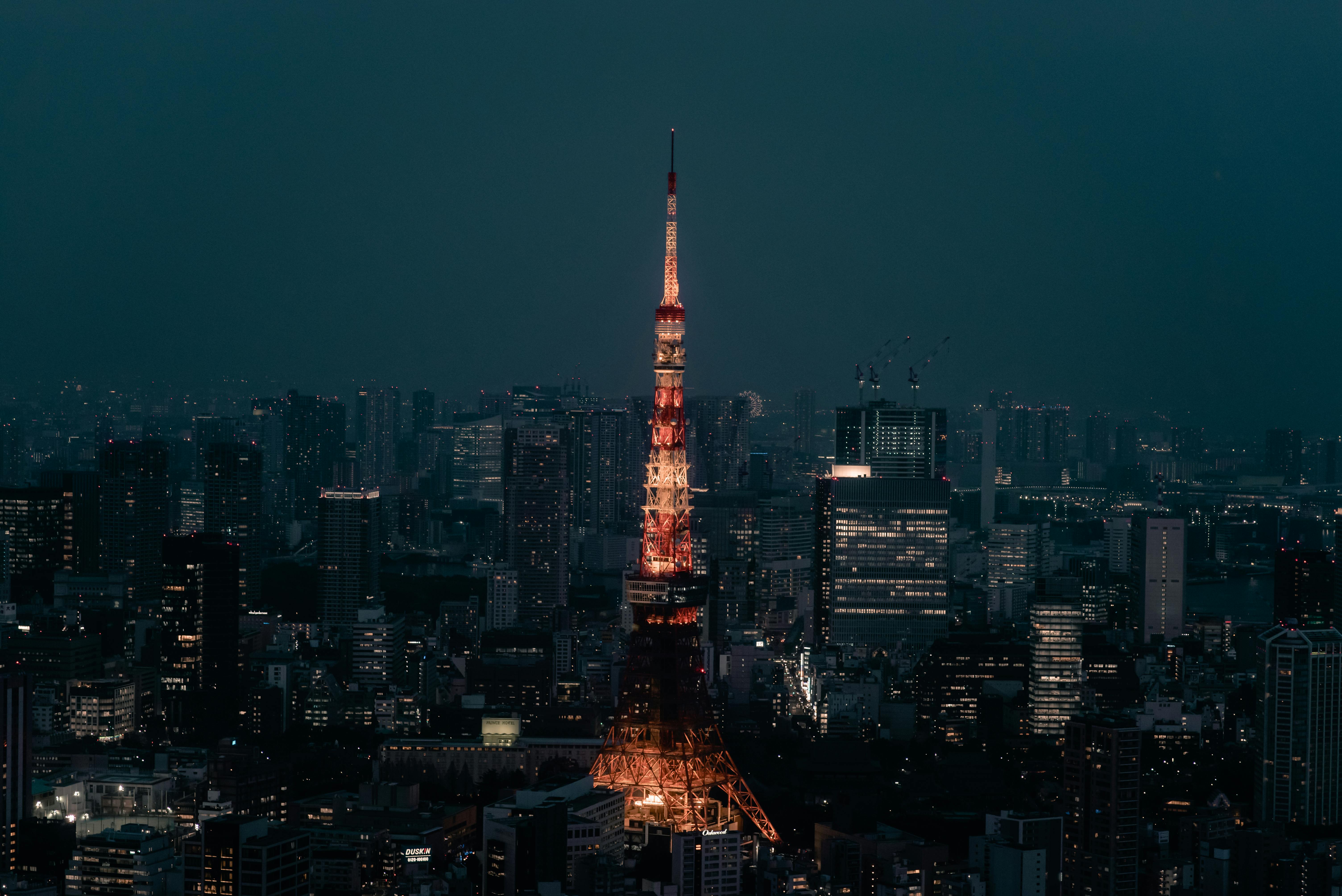 Tokyo Tower illuminated against the night sky